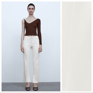 NWT. Zara Oyster White Asymmetric Trousers Size M.